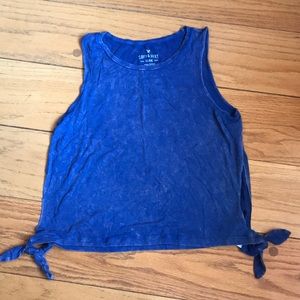 Blue tank top with cuts in the sides
